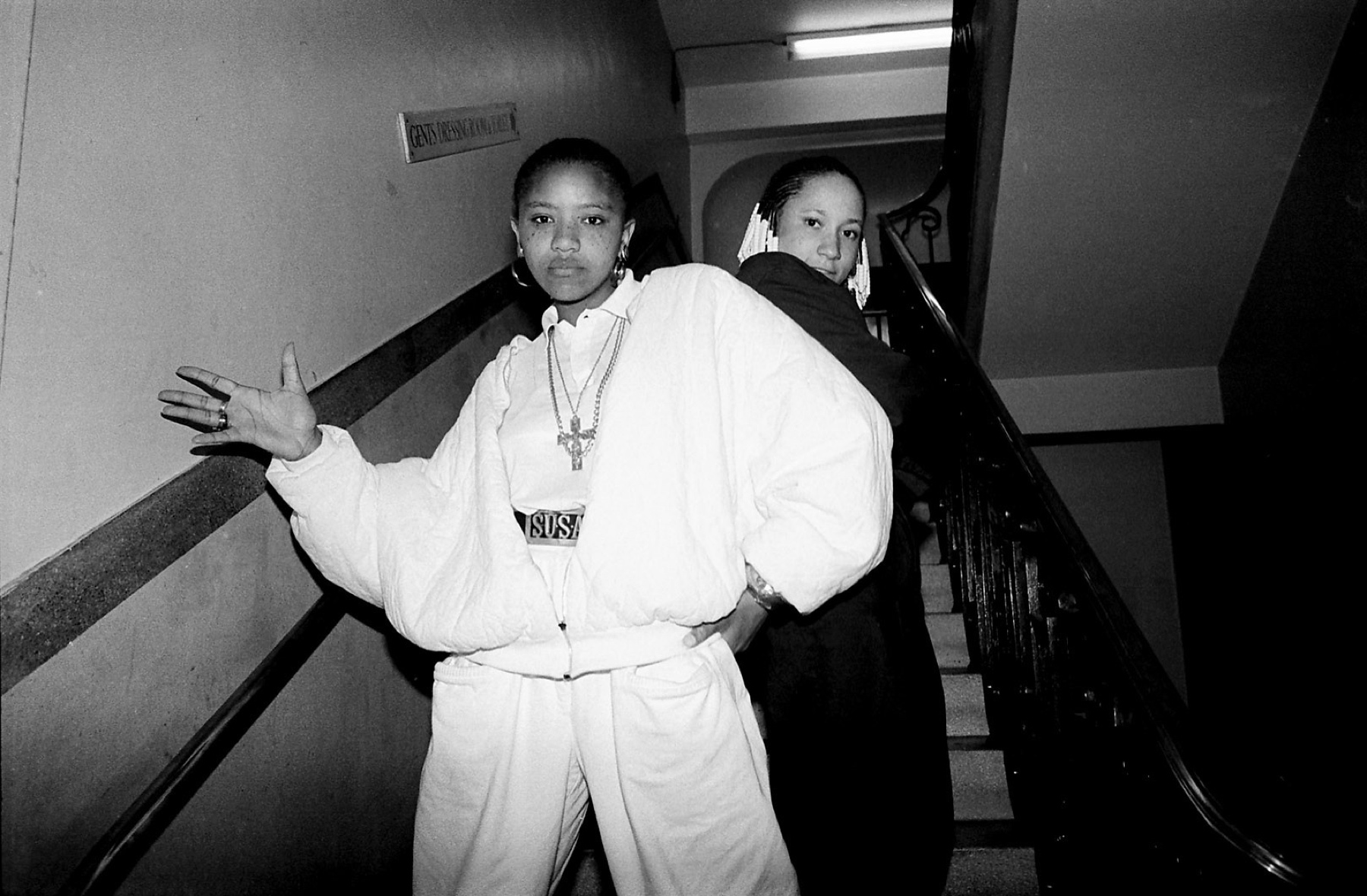 Cookie Crew posing for a photo in a stairwell, London, 1980s by Normski